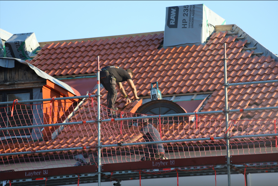 Roofing workers